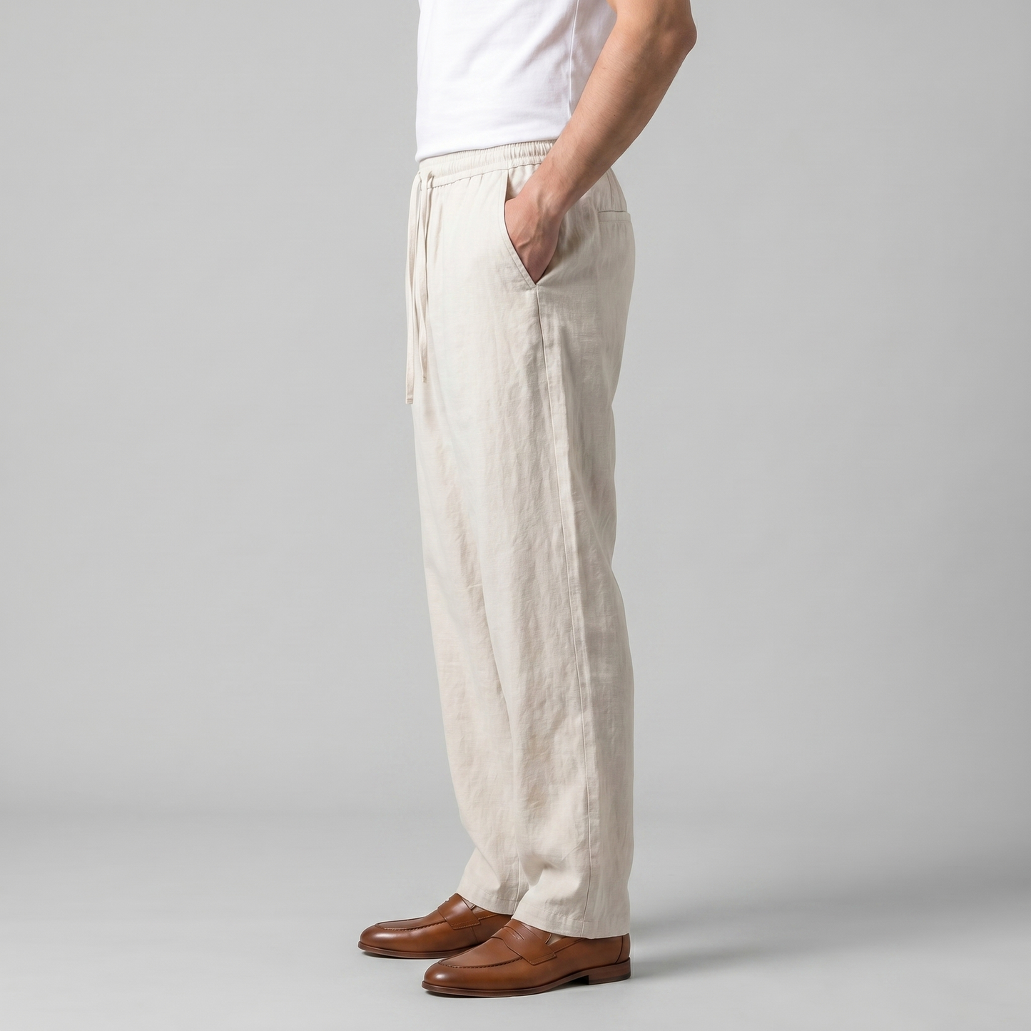 Dettaglio taglio largo — pantaloni uomo