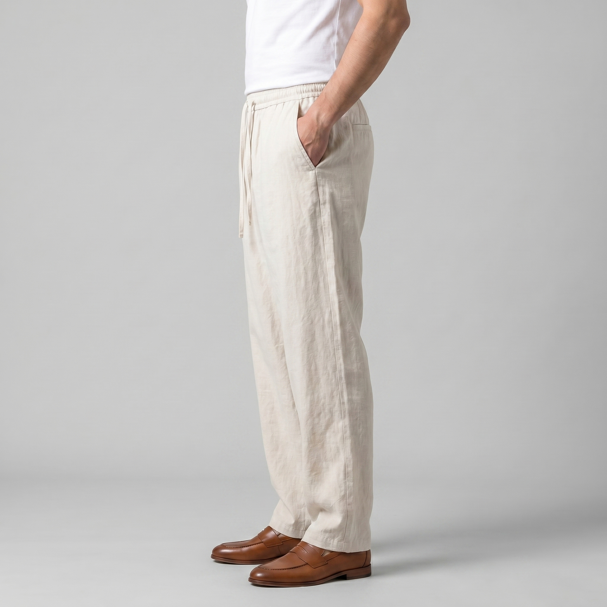 Dettaglio taglio largo — pantaloni uomo
